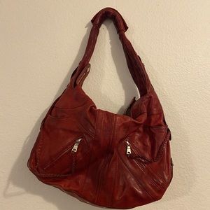 Andrew Marc red leather bag